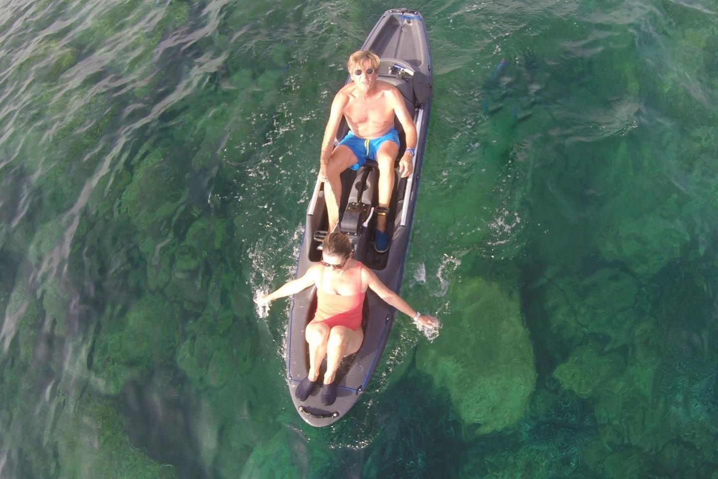 A space in the front of the kayak provides seating for a passenger