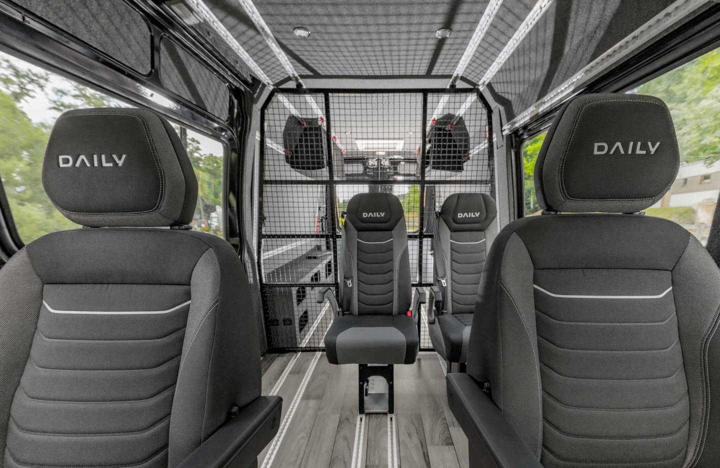 The partition/bed keeps the passenger and load areas separate