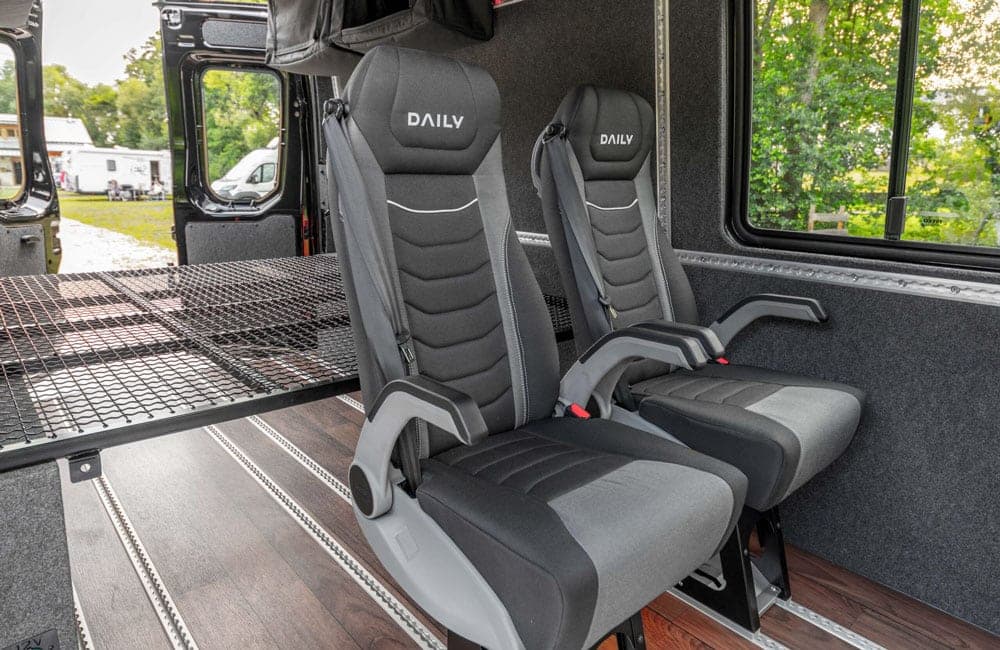 The included partition doubles as a bed platform, just add a mattress