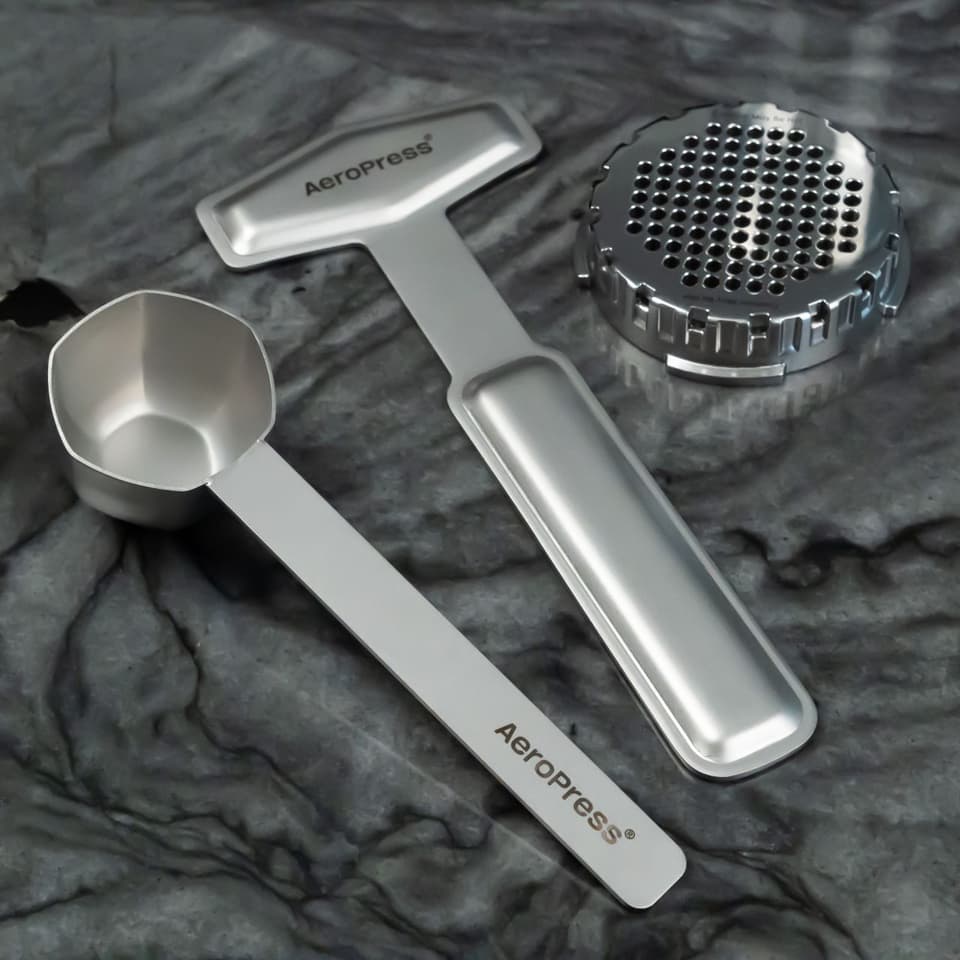 The Aeropress Premium kit includes a stainless steel scoop and stirrer