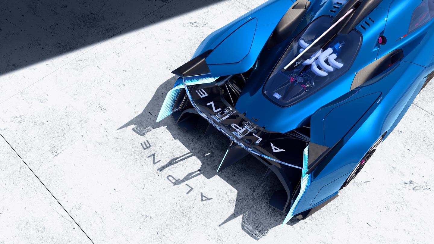 Look closely and you can see the thin exhaust tip contained inside the rear light blade, viewer's left