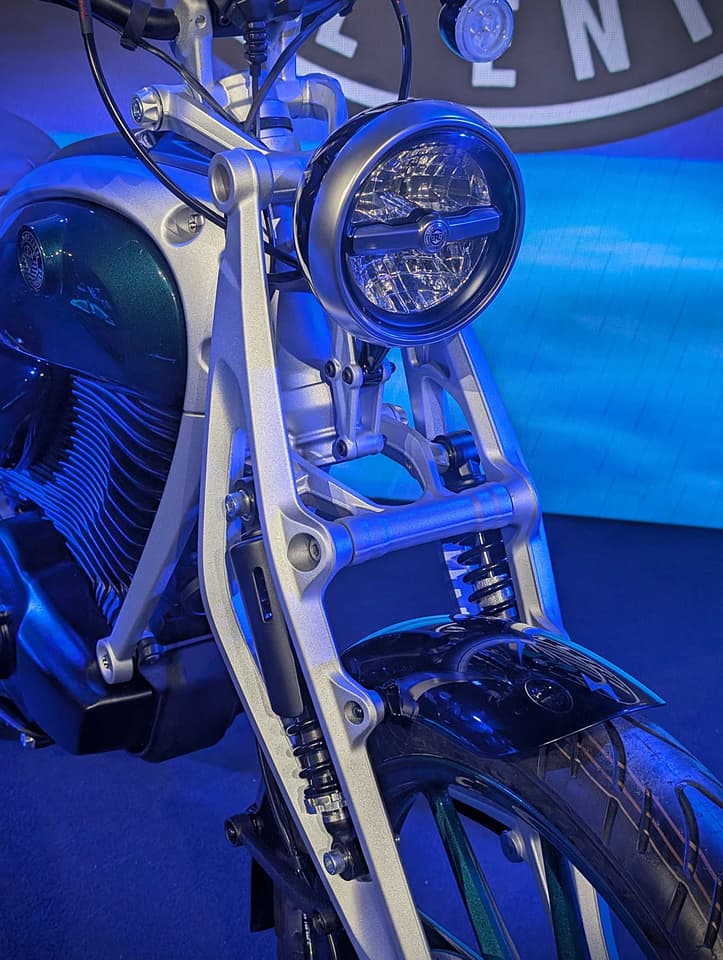 The front suspension incorporates a forged aluminum Girder fork