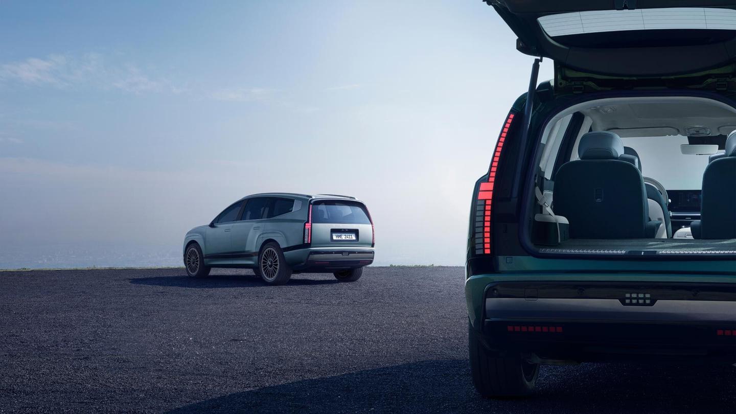 There's a standard power outlet in the cargo area to charge appliances, and you can close the tailgate from inside with the press of a button