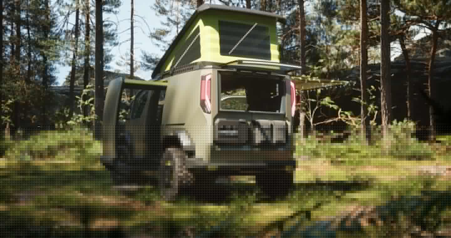 Kia shows the WKNDR's slide-out "Gear Head" storage module, pop-up roof and rear-mounted accessory kit