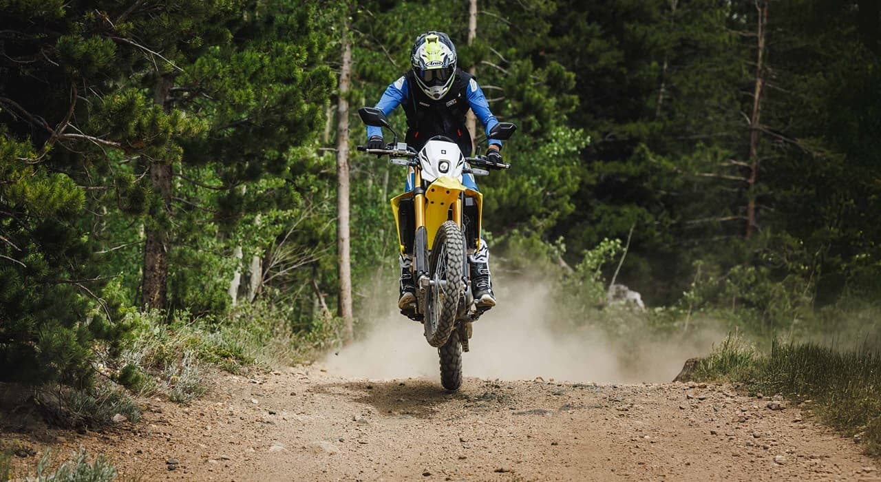 It is ideal for dirt riding, thanks to its long-travel suspension, knobby tires, and switchable ABS and traction control