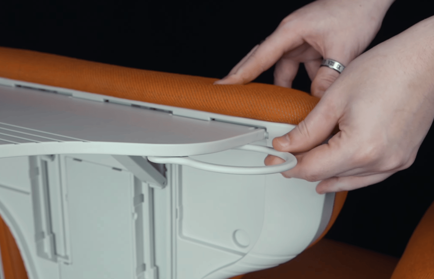 The cup holders swing out from the desk extension