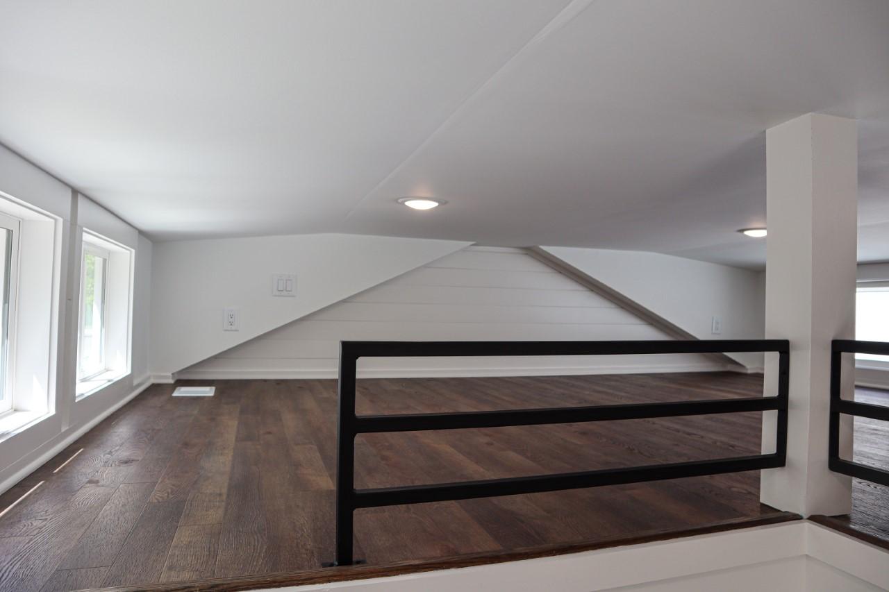 The Dogwood's loft can be used as a third bedroom or perhaps a storage space
