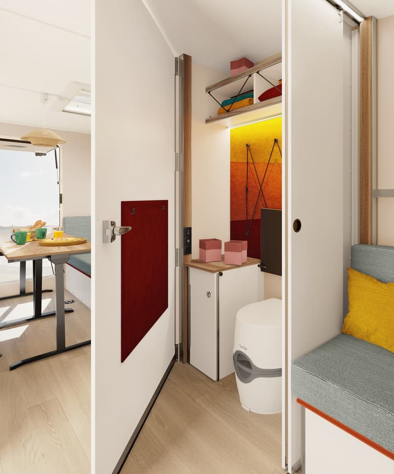 Revealing the stowaway toilet and extending the wall into a temporary WC