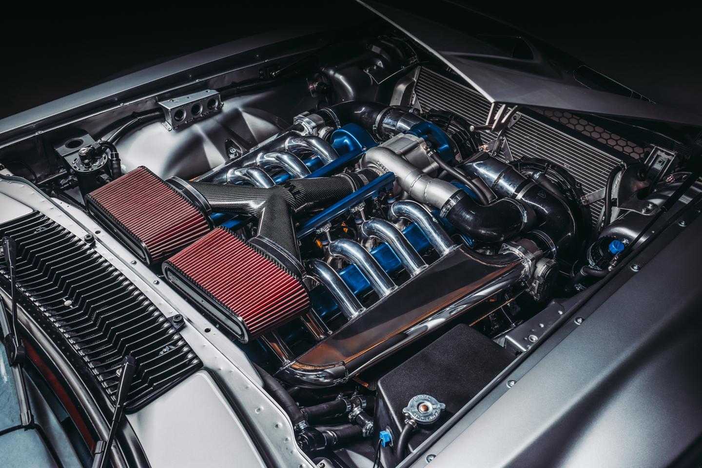 The 5.6-liter supercharged V12 engine was developed in-house by TWR engineers