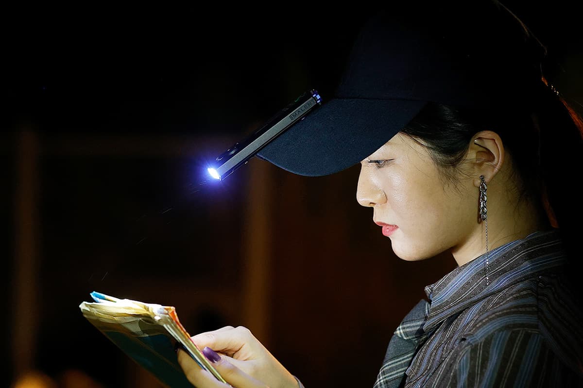 This flashlight can clip on to hats and straps, and even magnetically attach to metal surfaces to serve as a task light
