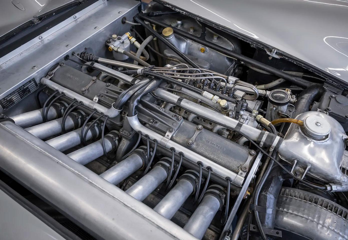 The engine of this car is one of the modern masterpieces – too tall for the space allowed by the streamlining, the engine was canted over. The W196 was the first real display of the dominance desmodromic valve gear offered over conventional valve springs.