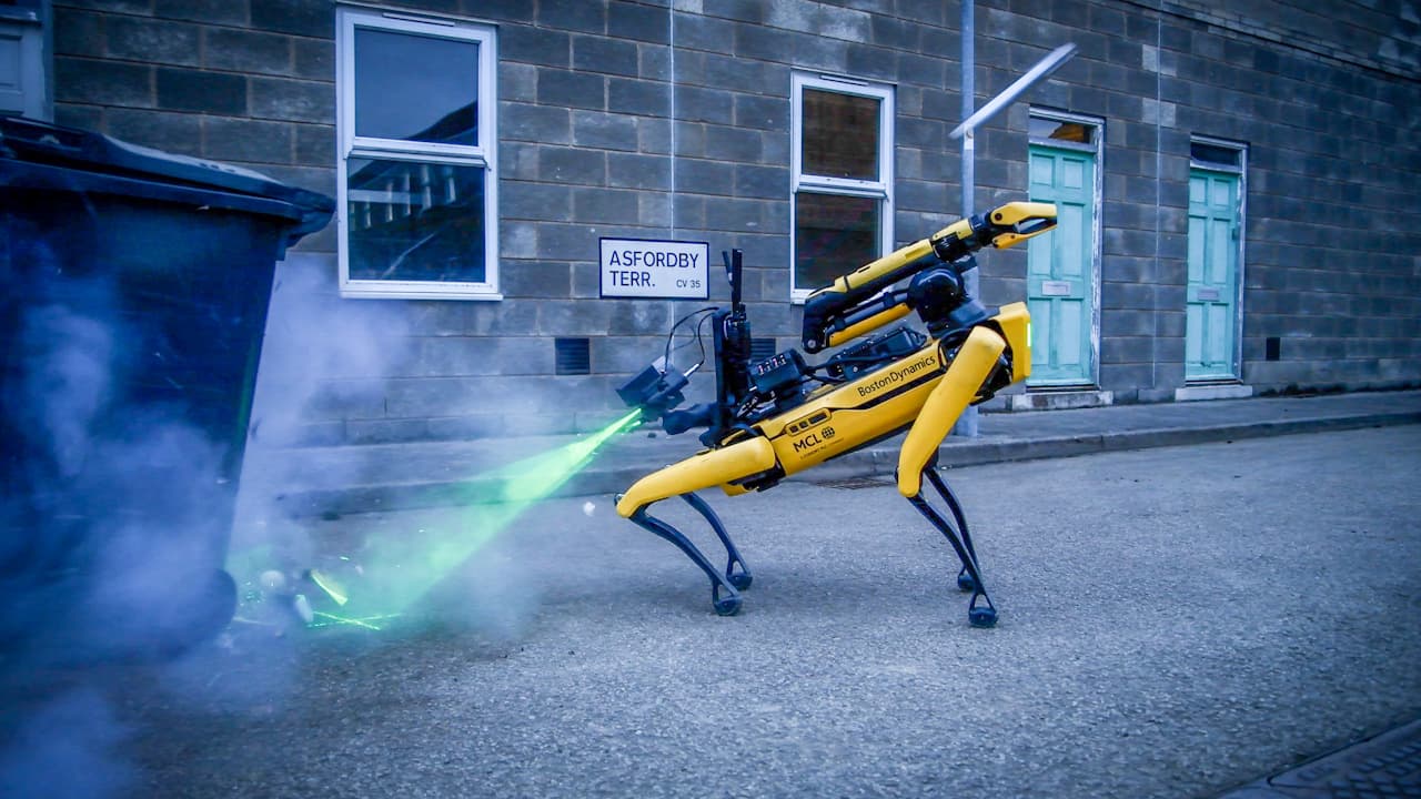 A robot dog targets a bomb for defusing