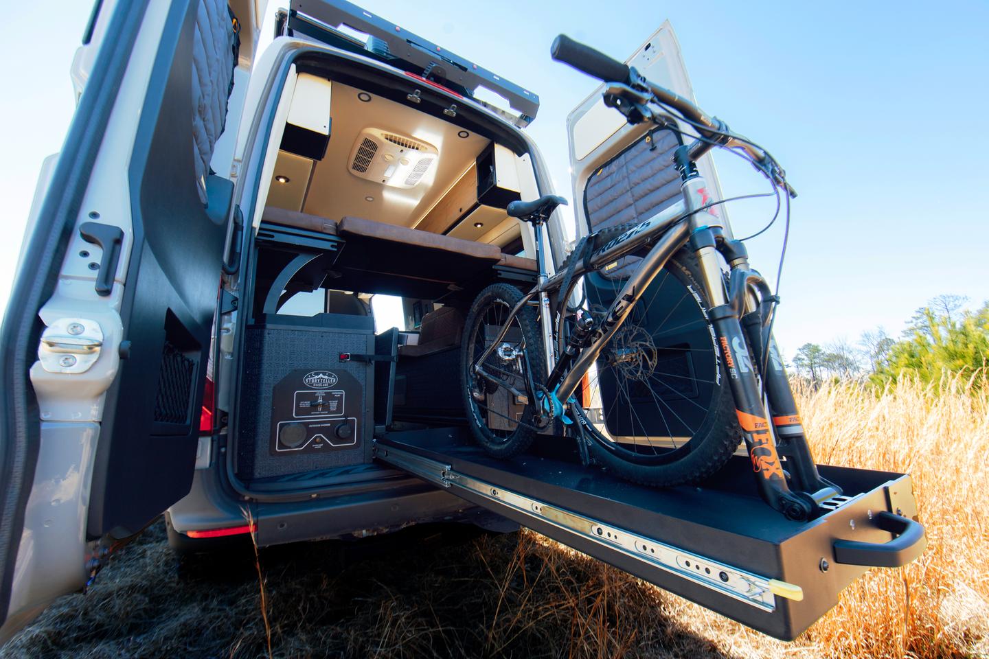 The Crew Mode comes with a trick hinged floor that flips over to reveal a 5-foot slide-out bike/cargo tray