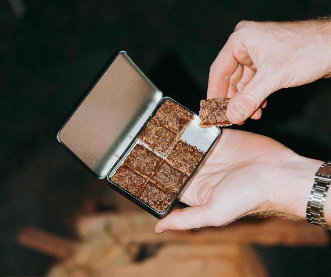 The tin stands up to rain to keep your tinder squares dry and is reusable to promote the type of circular usage for which the Coffee Campfire Starter was created