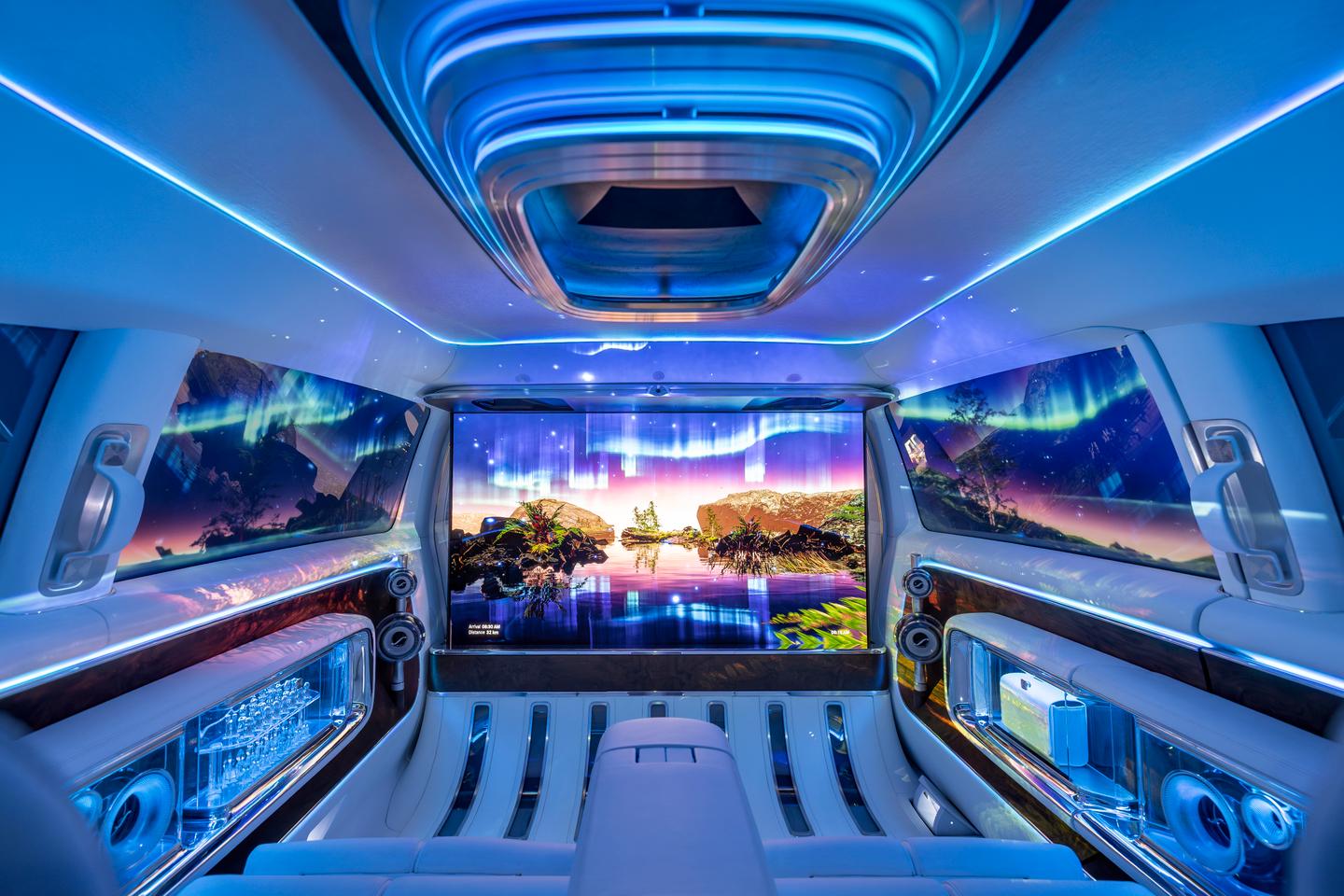 The 65-in 4K display emerges from the underfloor for movie viewing, gaming, video calls and other content, and the switchable-tint side windows serve as projection screens for the 7-unit headliner projection system