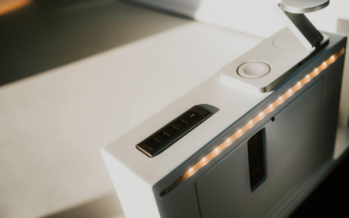Each tech pod features multiple USB ports, ambient light strips, a reading lamp and a pull-out side table