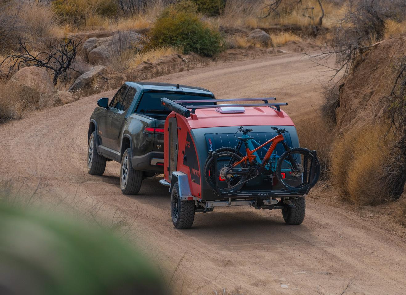 The Escapod Topo2 is ready to roll until the dirt track narrows too much; then the bikes can take over the ride