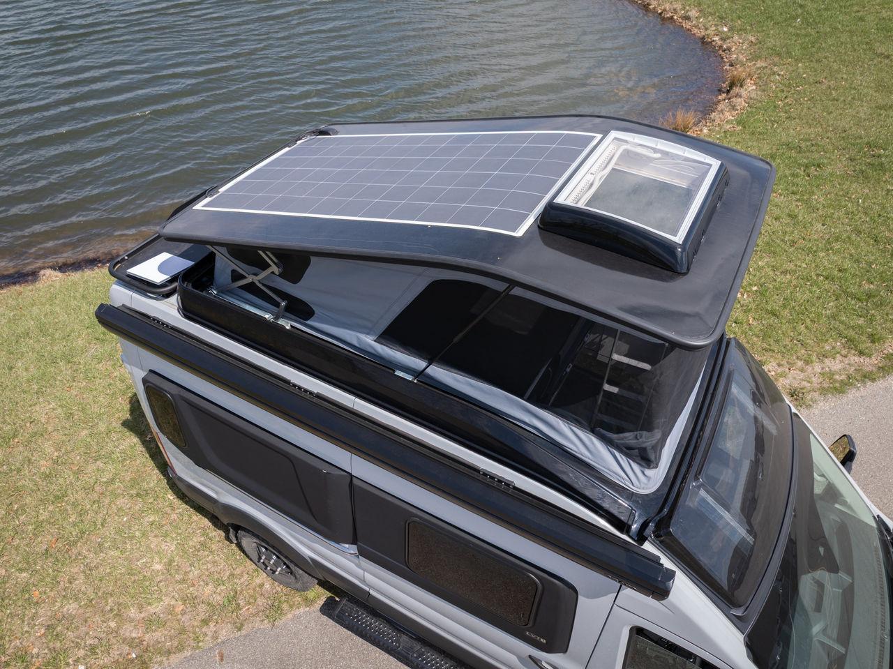 The pop-up roof includes a panoramic fabric design and skylight