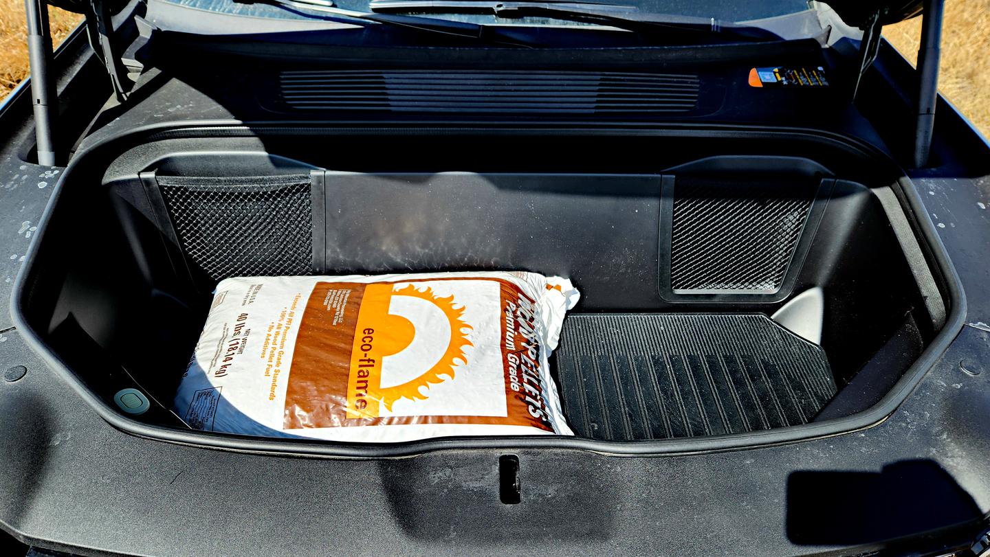 The big frunk in the Rivian R1T requires one to reach up and over the front grille