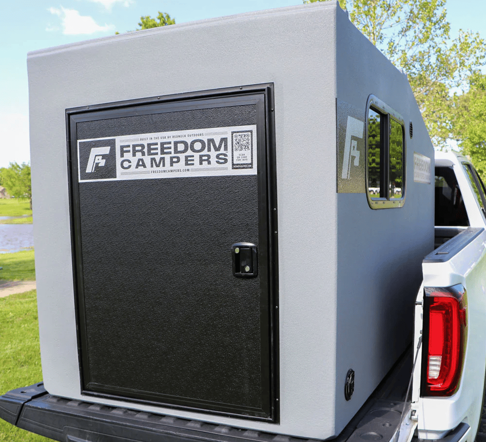The extra space between the Freedom pod and pickup rails exists on the 48-in version that fits between the wheel wells of full-size and some smaller trucks