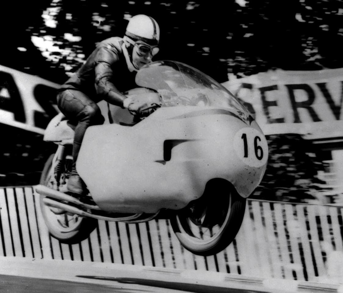 John Surtees won both the 350cc and 500cc World Championships for three years running - 1958, 1959 and 1960.