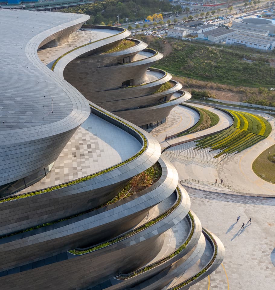 The Shenzhen Science & Technology Museum's terrace areas include greenery and offer views of the surrounding area