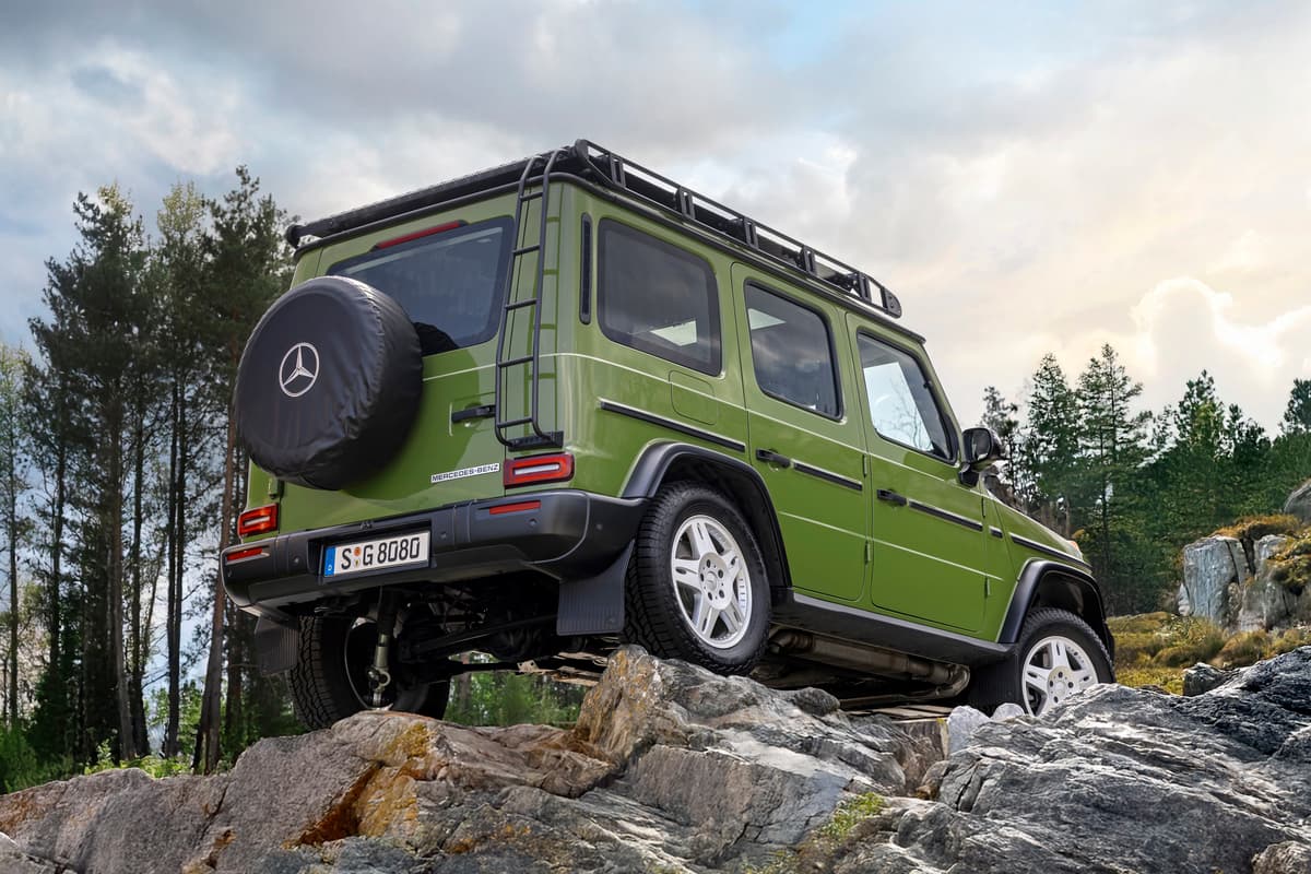 The G-Class STRONGER THAN THE 1980s features a large roof rack, a ladder, and a special soft cover for the spare wheel