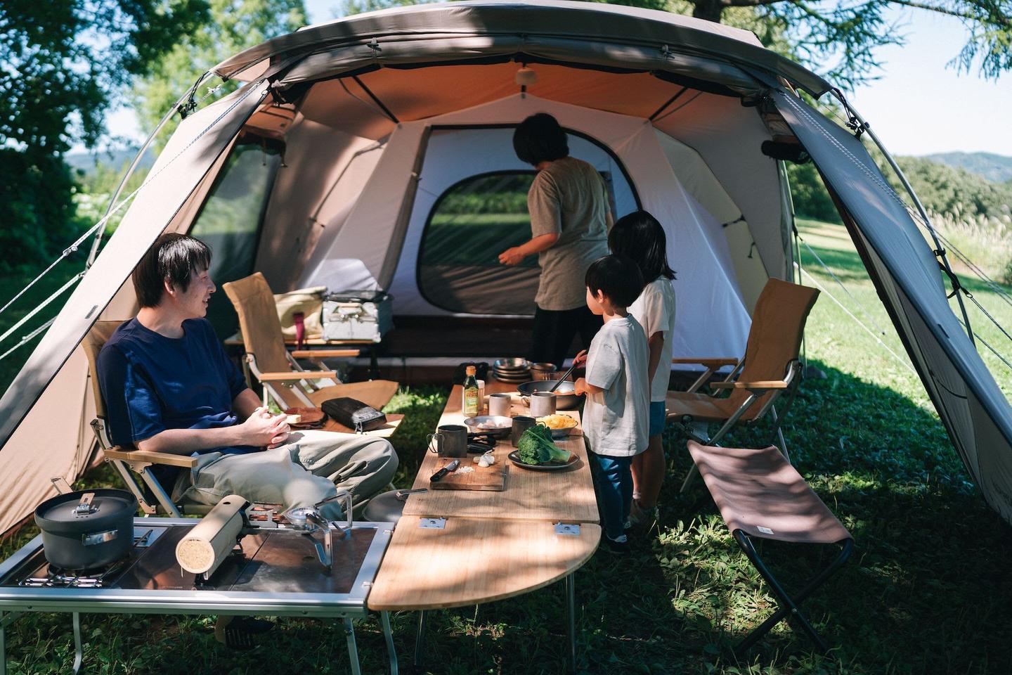 A covered outdoor dining, cooking and relaxing space right next door to the sleeping tent